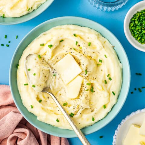 yukon gold mashed potatoes in a bowl with a spoon