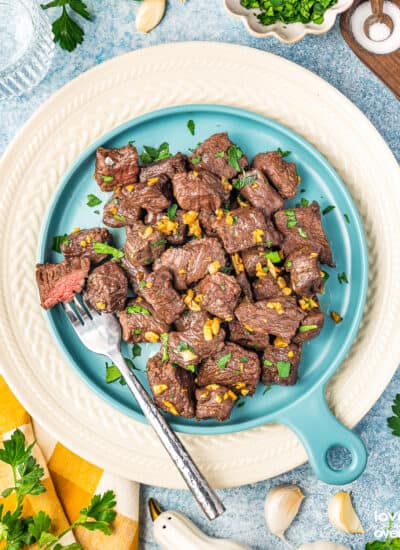 a plate of air fryer steak bites with a fork