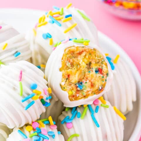 A bite taken out of a birthday cake pop