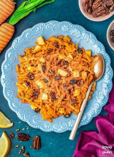 a plat full of carrot raisin salad
