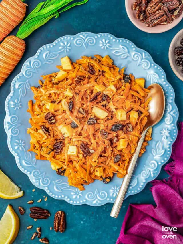 a plat full of carrot raisin salad