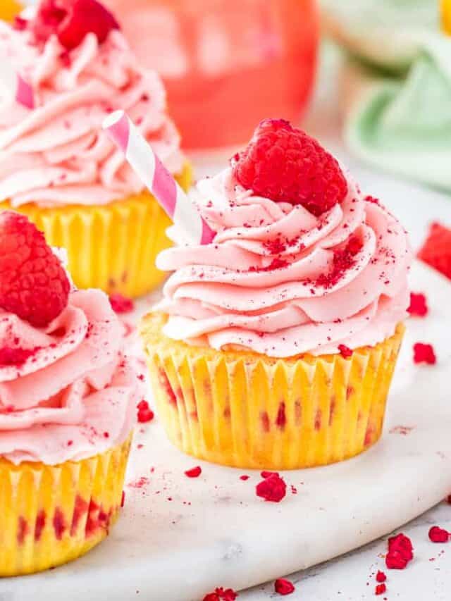 raspberry lemonade cupcakes on a white table