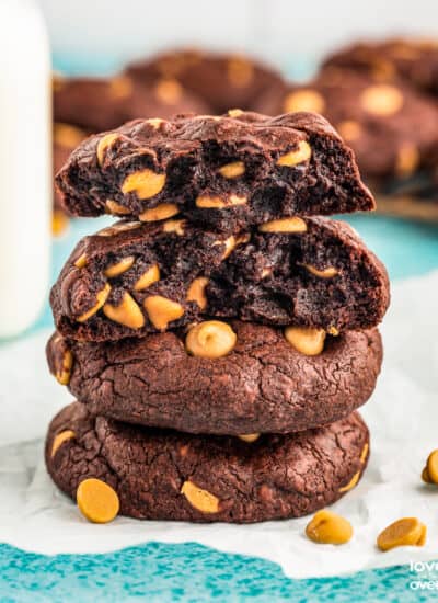 a stack of chocolate cookies with peanut butter chips
