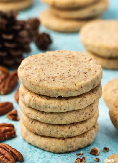 a stack of pecan sandies cookies