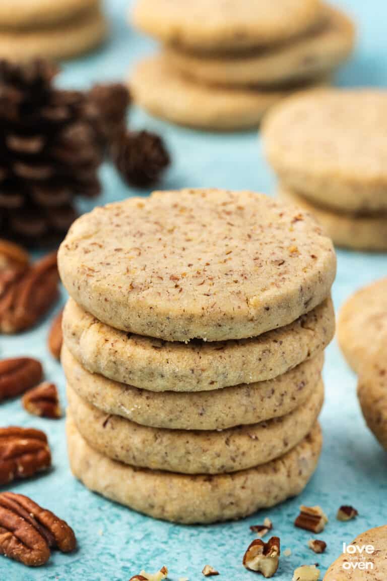 a stack of pecan sandies cookies