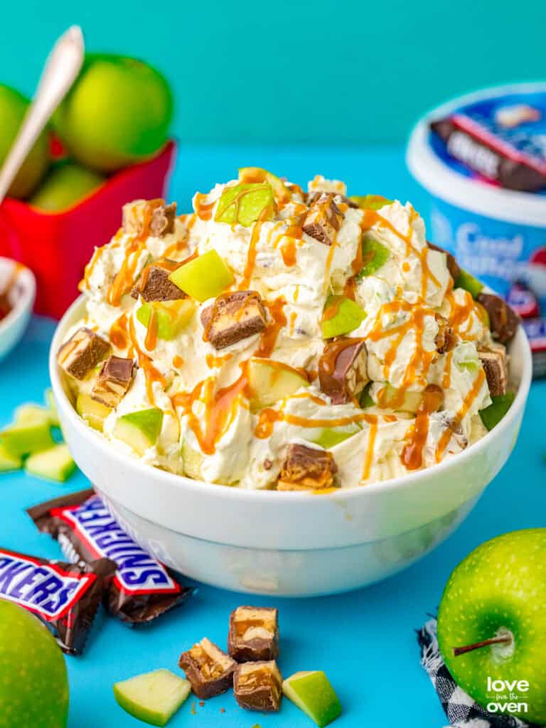 A bowl of snickers apple salad.