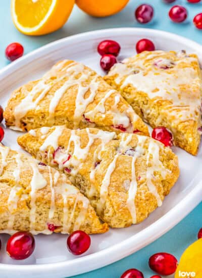 A place of cranberry scones with orange glaze