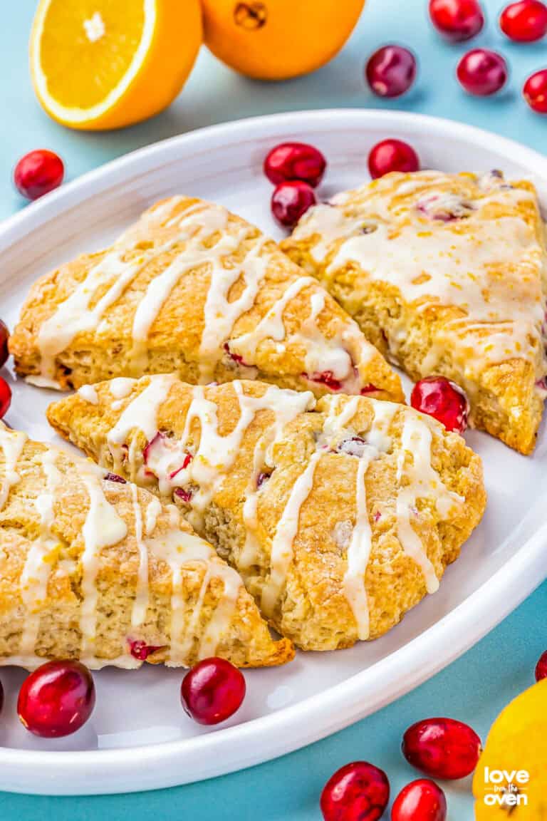 A place of cranberry scones with orange glaze