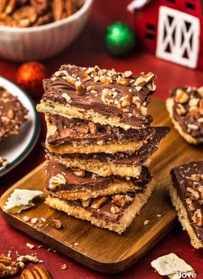 a stack of pieces of cracker toffee made with saltines