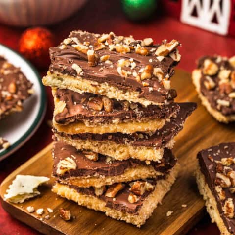 a stack of pieces of cracker toffee made with saltines
