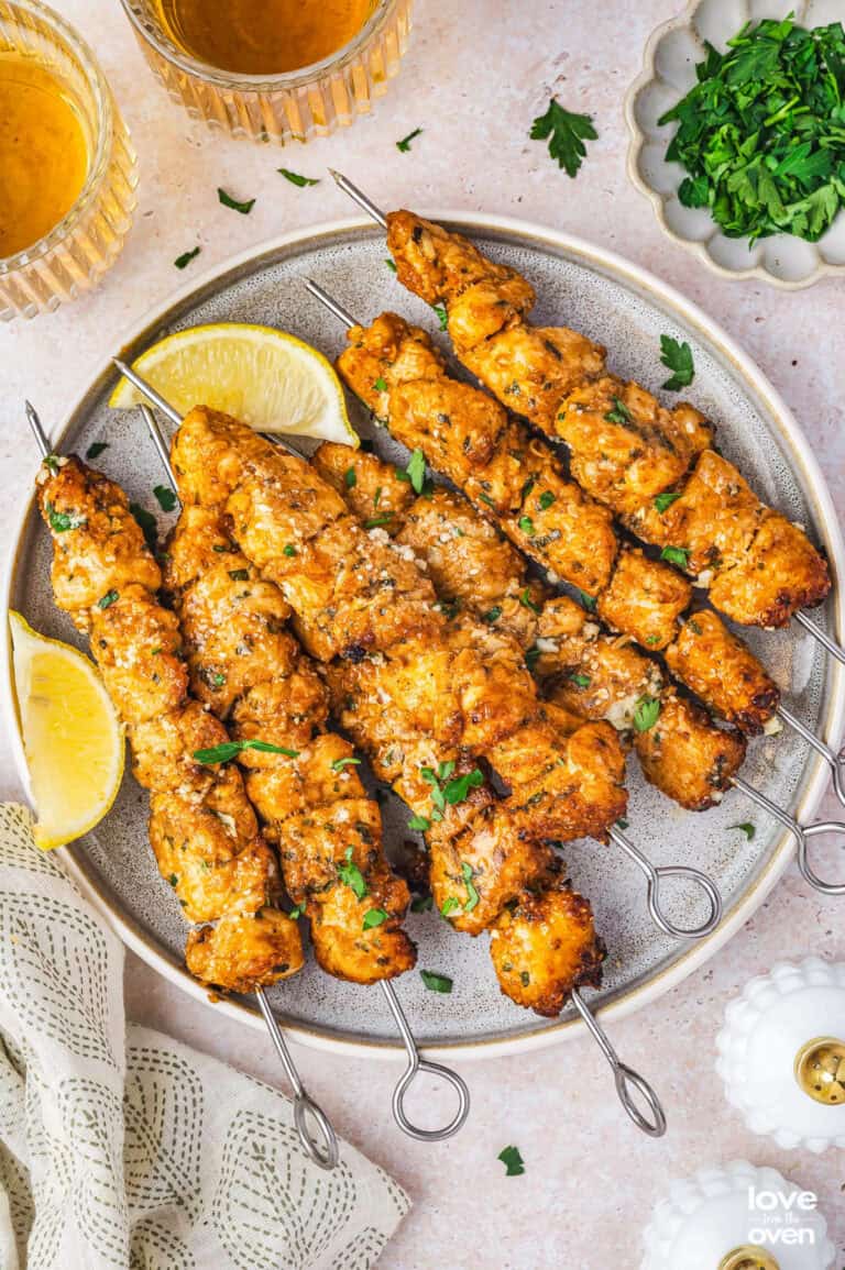 A plate of chicken skewers