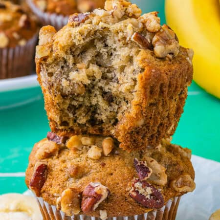 one banana nut muffin stacked on another