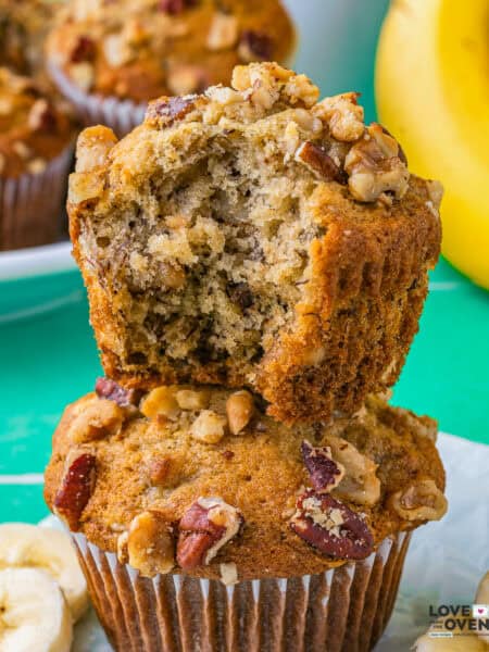 one banana nut muffin stacked on another