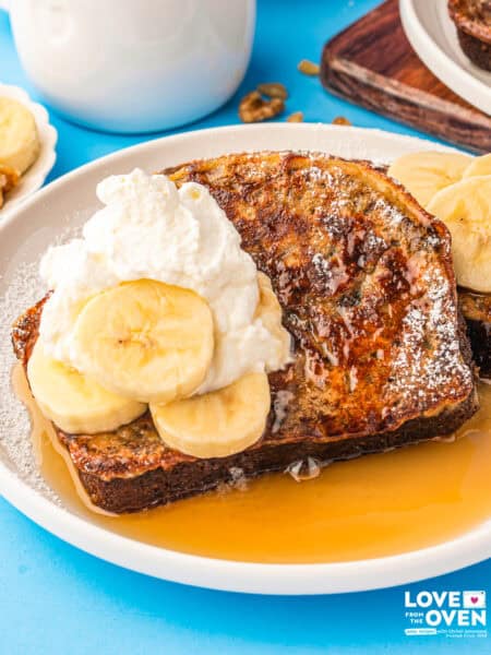 Banana bread French toast on a plate with syrup