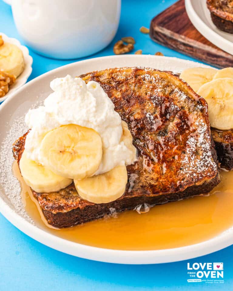 Banana bread French toast on a plate with syrup
