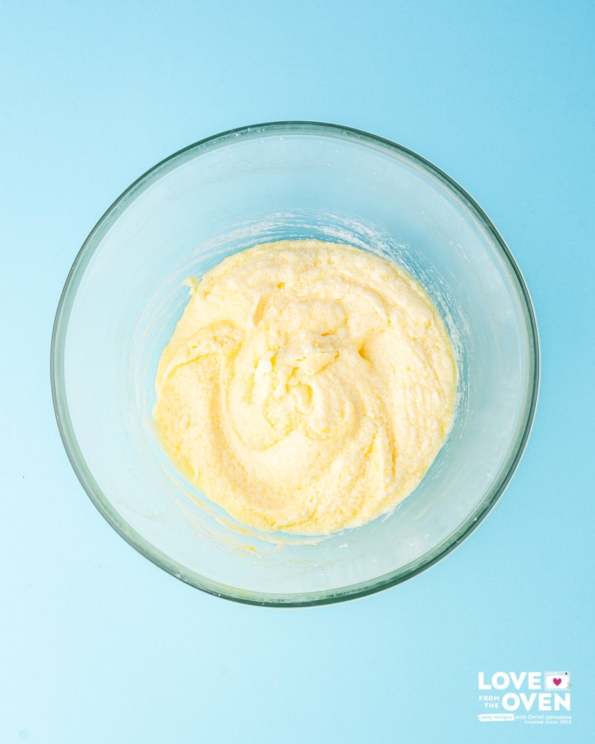 Butter and sugar combined in a bowl