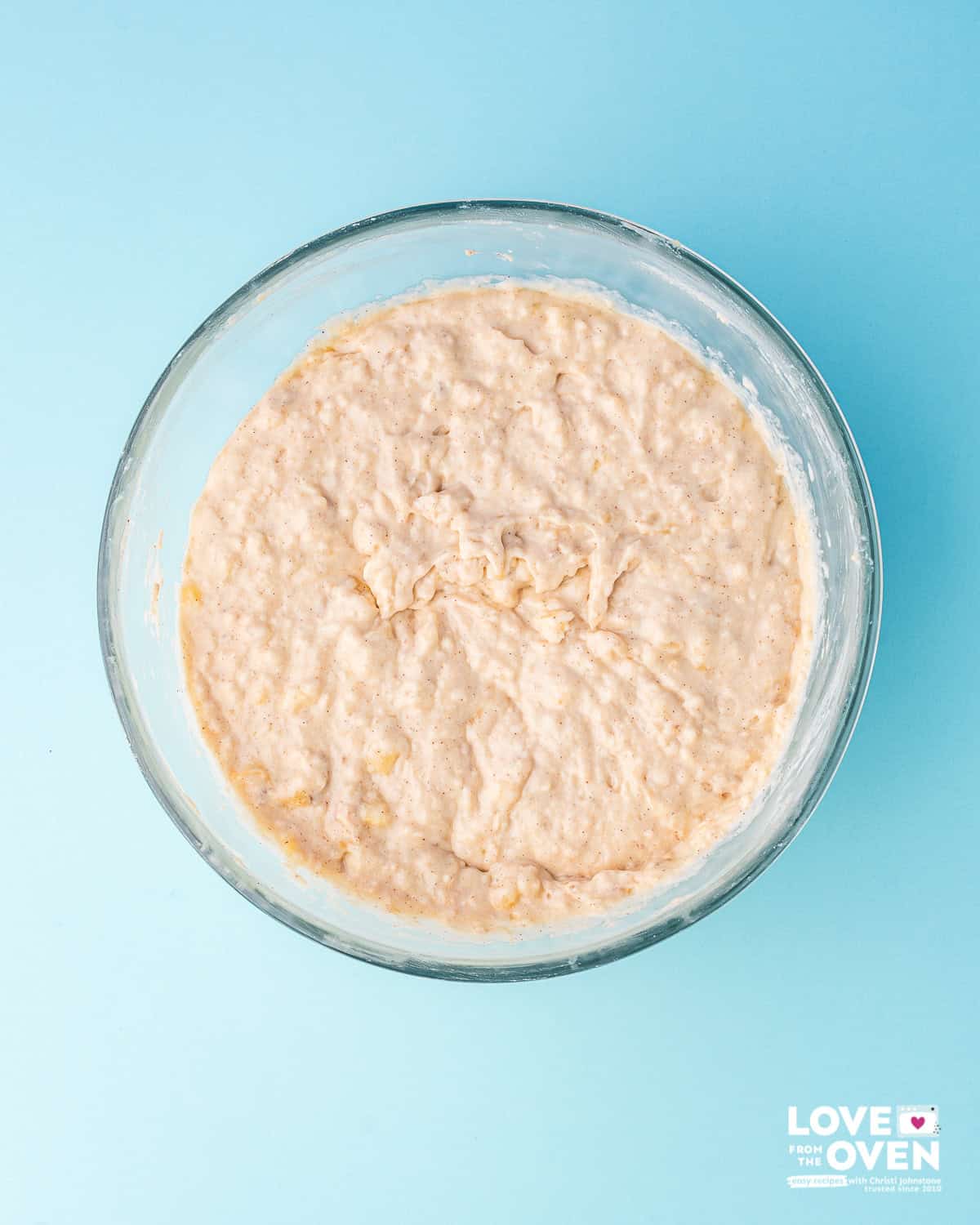 Batter for banana bread in a bowl