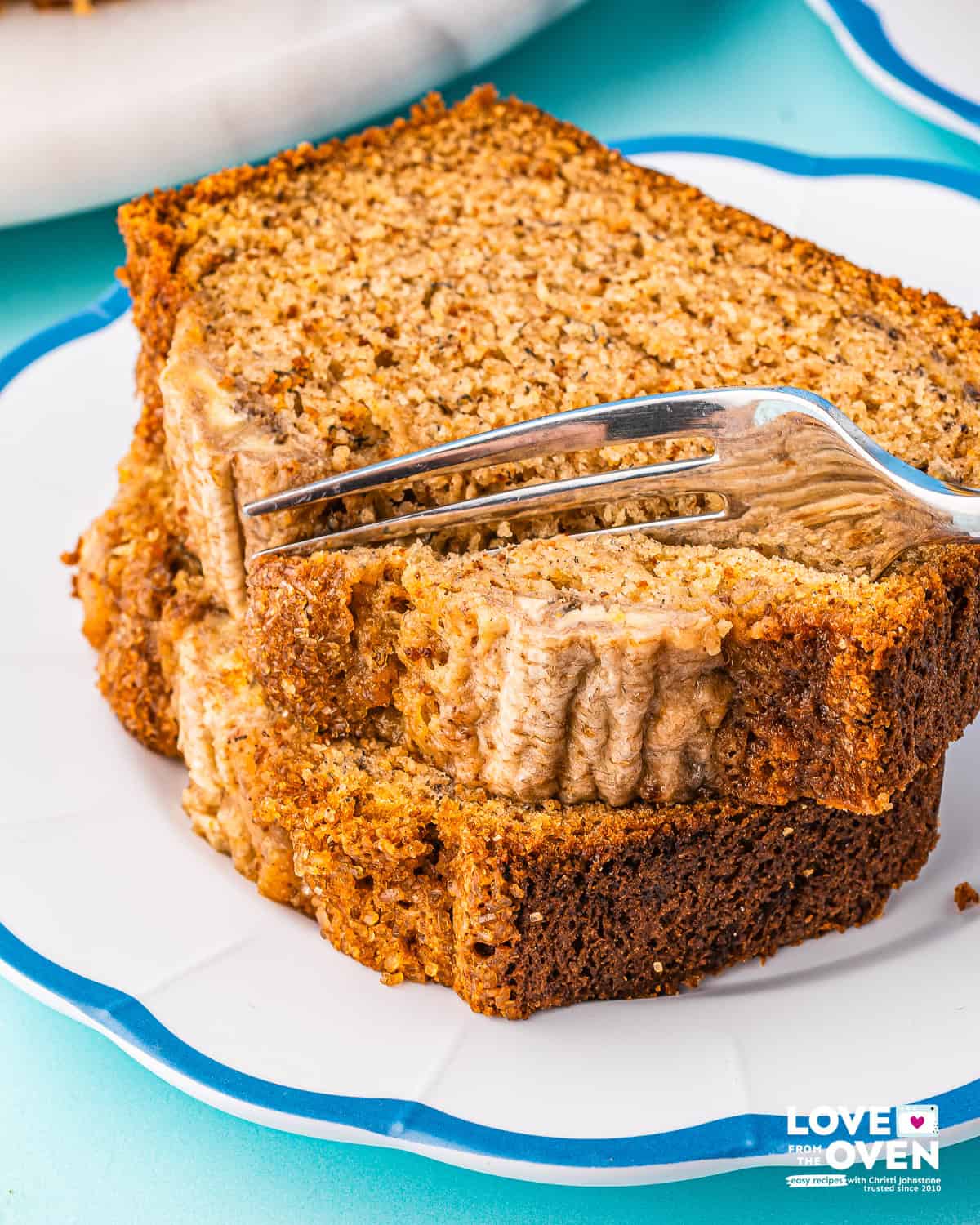a fork cutting off a piece of brown butter banana bread